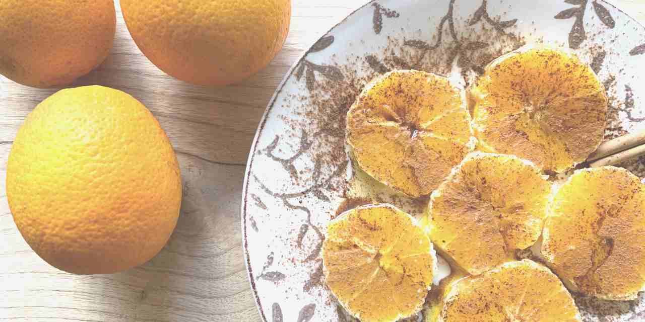 Sliced oranges with cinnamon and olive oil